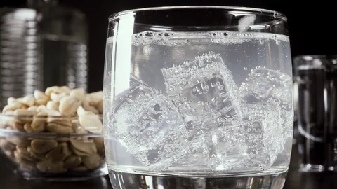 Slow motion a glass of vodka on the table with a snack Stock Footage 92033095