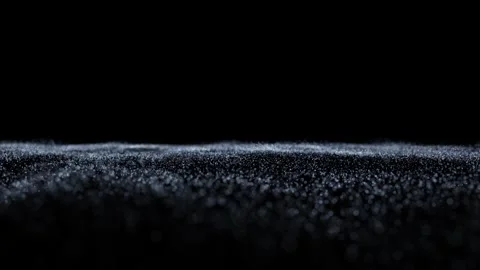 Slow motion glowing dotted waves flying on clean black background Stock-Footage 340587957