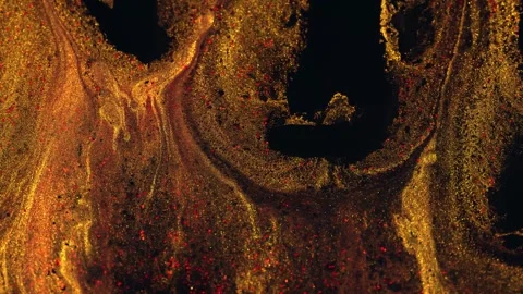 Slow Motion of gold particles in a red liquid. Impressive spectacle of sparkling Video stock 271192299