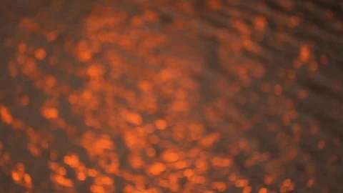 Slow motion golden background slow motion wave of light sunset on surface water  Stock-Footage 127404156