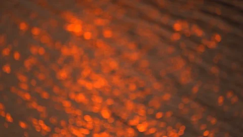 Slow motion golden background slow motion wave of light sunset on surface water  스톡 동영상 127404204