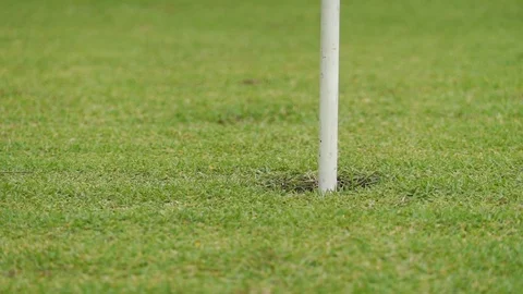 Slow motion of Golf balls don't falls into the hole Stock Footage 113512703