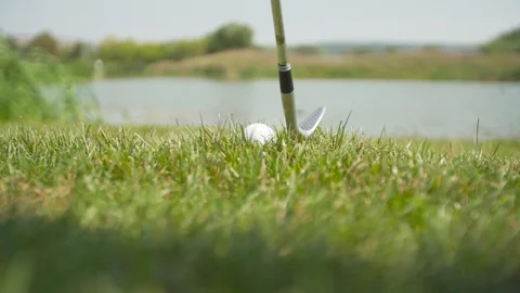 Slow motion golf swing from behind Stock Footage 96012016