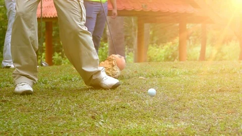 Slow motion golfer hitting golf ball tee off on Teeing Ground Stock Footage 82629830