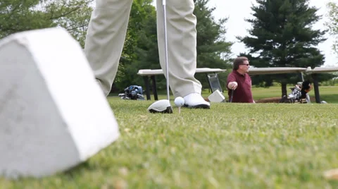Slow motion of a golfer tee off Stock Footage 30224708