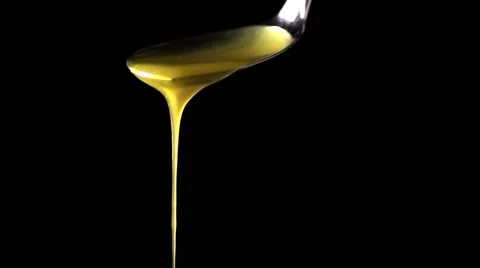 Slow motion goose grease drips Stock Footage 68963010