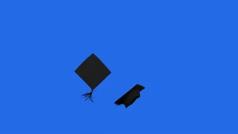 Slow motion of graduation caps thrown on the air in the studio with blue screen Video stock 153397267
