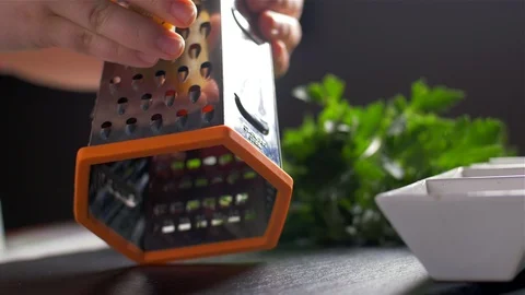 Slow motion of a  grated parmesan cheese, typical Italian cheese Stock Footage 106152971