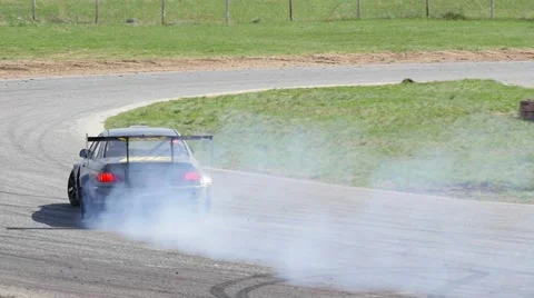 Slow motion of a gray car drifting u-turn during a race Stock Footage 63505075