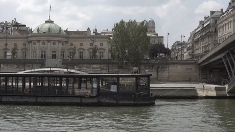 SLOW MOTION: Great perspective of Paris shot on boat cruise on river Seine Stock Footage 105143752
