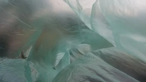 Slow motion of green plastic swaying in the wind Stock Footage 306669490