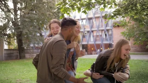 Slow motion of a group of happy and excited hipster teenage friends Stock Footage 75577261