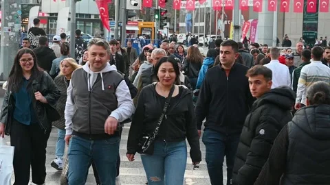 Slow motion of a group of people are crossing the street at a crosswalk Stock Footage 292014538