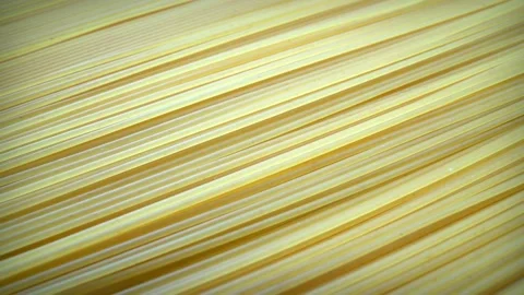 Slow motion of a group of uncooked pasta Stock Footage 131396284