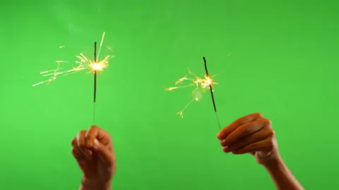Slow motion growing firework on hand for party on green screen background 動画素材 219939498