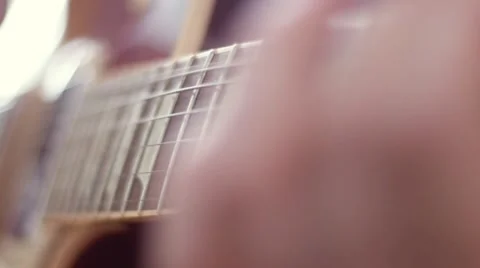 SLOW MOTION: guitar strings rack focus Stock Footage 49639081
