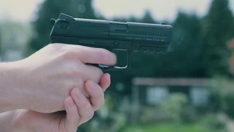 Slow motion gun being fired Stock Footage 71996786