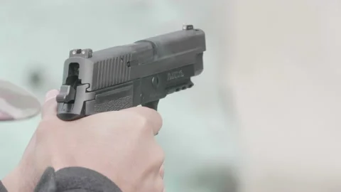 Slow Motion Gun Range Pistol Shot, Weapon Fire Firearm Bullet Shooter Handgun Stock Footage 144680261