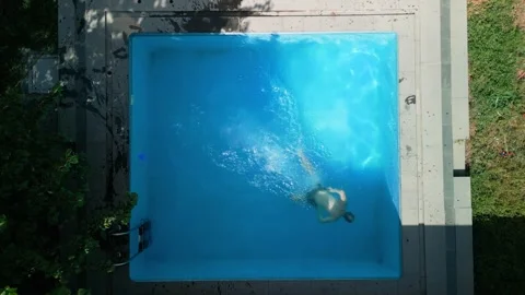 Slow motion, guy in the pool Stock Footage 251235585