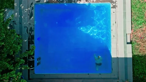 Slow motion, guy in the pool Stock Footage 251236900