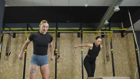 Slow motion gym workout showcasing strength training techniques Video stock 321399290