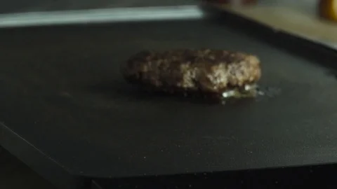 Slow Motion Hamburger Patty Sizzle With Steam and Spatula Scoop 스톡 동영상 70930367