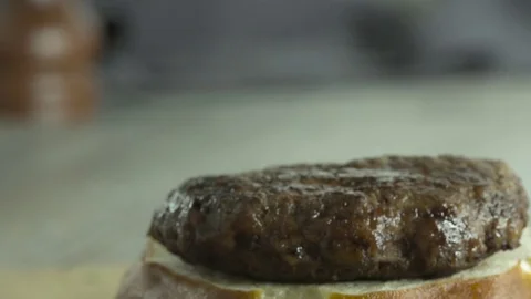 Slow Motion Hamburger Toppings Drop; Large Tomato and Lettuce 스톡 동영상 70935818