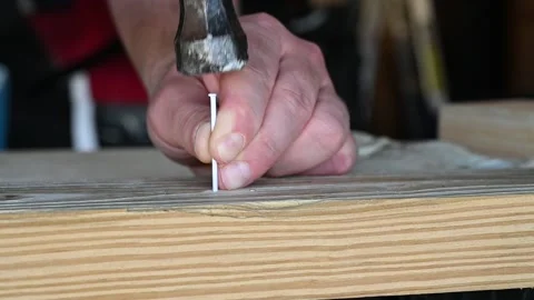 Slow motion hammering in a nail - bent nail Stock Footage 138663165