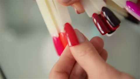 Slow Motion Hand Choosing Nail Samples. Close Up Set Of Multicolored Collection Stock Footage 109233365