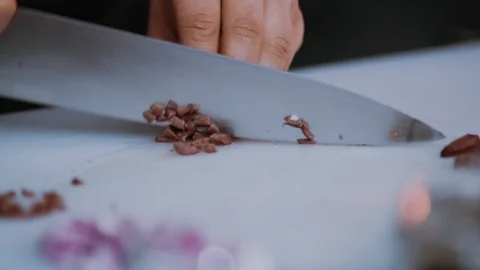 Slow motion hand man chef with knife cutting olive tasty slicing healthy eat Stock Footage 100303769