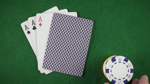 Slow motion hand puts chips on the table top view Stock Footage 85642451