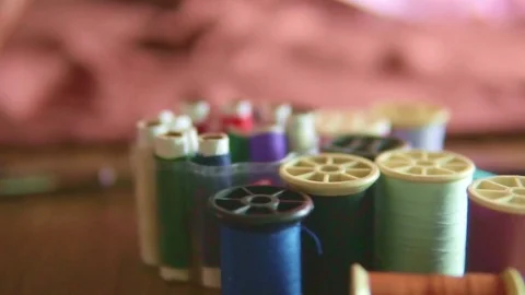 Slow motion a hand of a tailor who makes the tissue measurements with the tape Stock Footage 75951629
