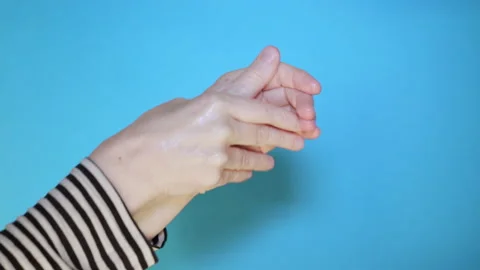 Slow motion hand washing with hand sanitiser gel Stock Footage 132460039
