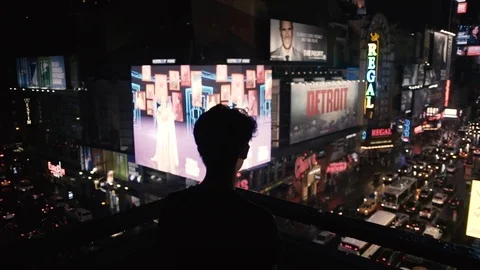Slow motion Handheld Dollyback of person looking at times square New York View Stock Footage 78125903