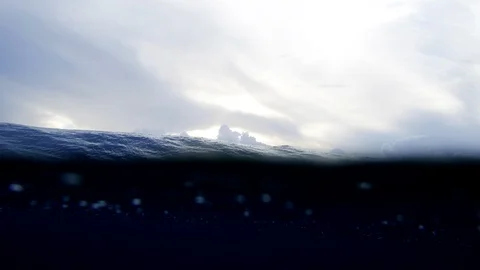 Slow motion handheld shot of huge wave breaking in sea during sunny day 스톡 동영상 96399507