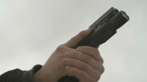 Slow Motion Hands Aim Handgun and Almost Pull Trigger Video stock 60706580