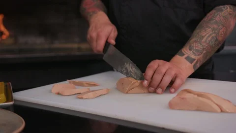 Slow motion hands сhef cutting food with a knife raw lunch condiment Stock Footage 103288524