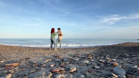Slow motion of happy couple dancing Stock Footage 261672428