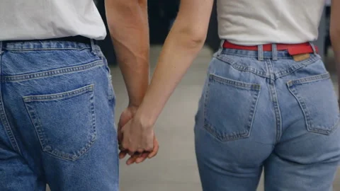Slow motion. Happy couple is hugging. View from behind Stock Footage 110048985
