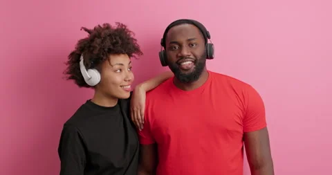 Slow motion of happy dark skinned Afro American woman and man stand closely to Stock Footage 149917397