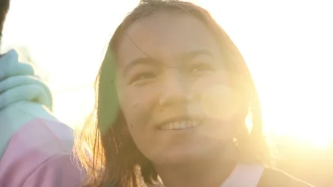Slow motion of happy person during sun set Stock Footage 150394786