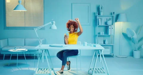 Slow motion of happy young black woman in casual yellow t shirt dancing and Stock Footage 164382736