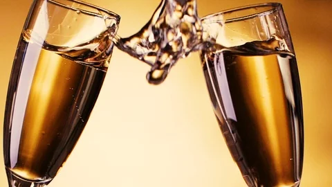 Slow Motion of having a toast with two champagne glasses. HD. Stock Footage 119259846