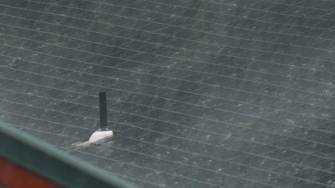 Slow Motion Heavy Rain Rooftop Medium, 4K Stock Footage 100997794