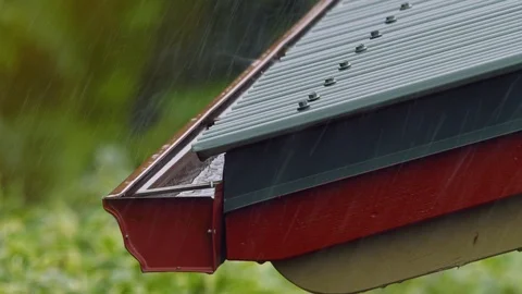 Slow Motion Heavy Rain Rooftop to Gutter Medium, 4K Stock Footage 100997817