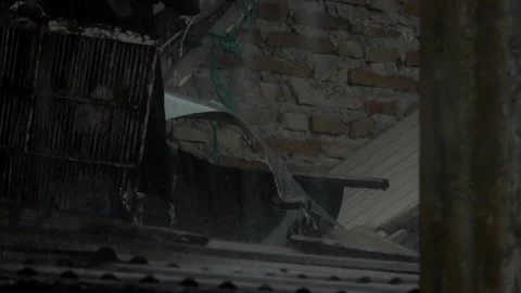 Slow Motion. Heavy Rainwater Flows Between the Roofs of Residents' Houses Stock Footage 309502166