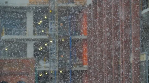 Slow Motion Heavy Snow Flakes Falling Urban Construction Background Wi Video stock 87414727