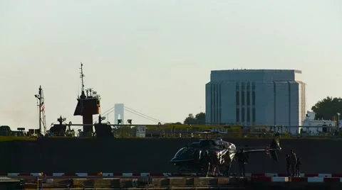 Slow Motion Helicopter with Passing Barge Stock Footage 57169675