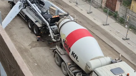 Slow Motion High Angle Concrete Discharging And Boom Tilt Budapest Stock Footage 336333442