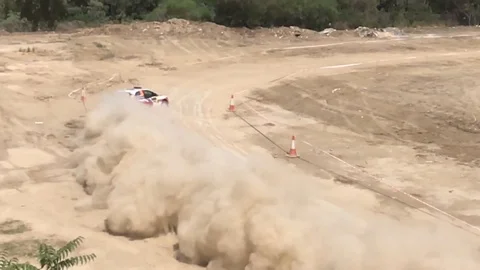 Slow Motion High Angle Shot of a Rally Car in the track Stock Footage 91118100